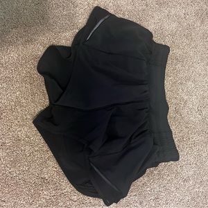 Lululemon black hotty hot shorts, size 4, low rise, 2.5 inch inseam